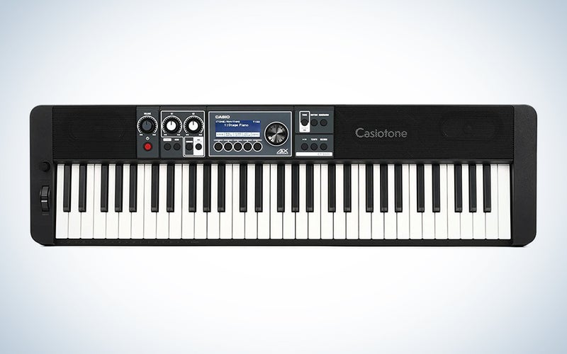 A Casio Castiotone electric piano on a blue and white background