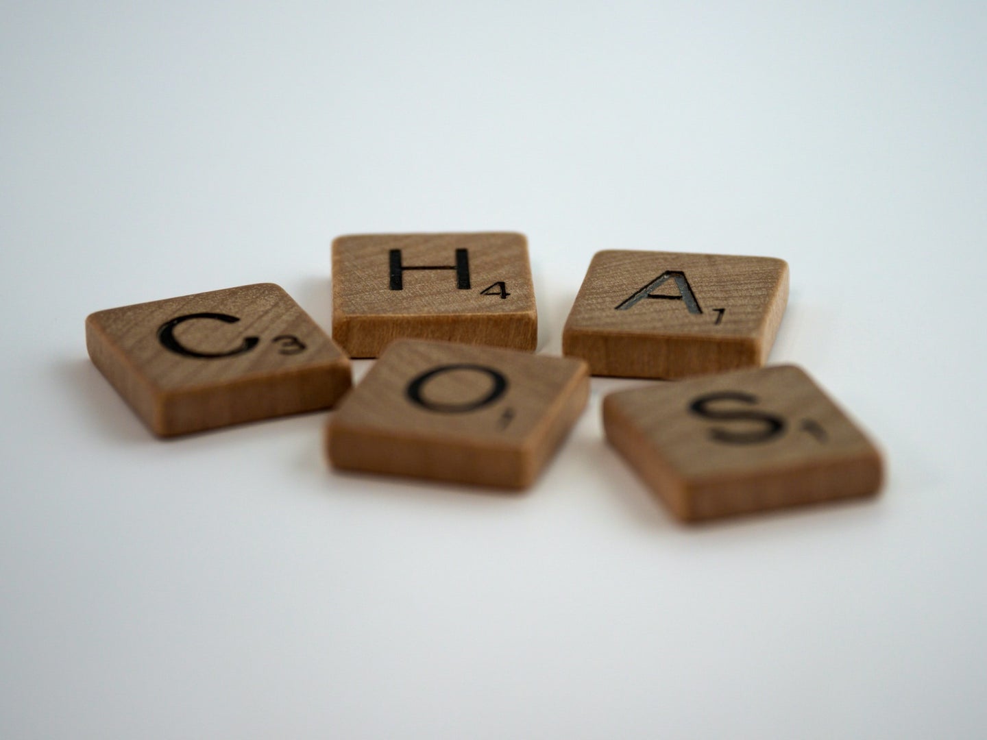 Chaos spelled in Scrabble pieces