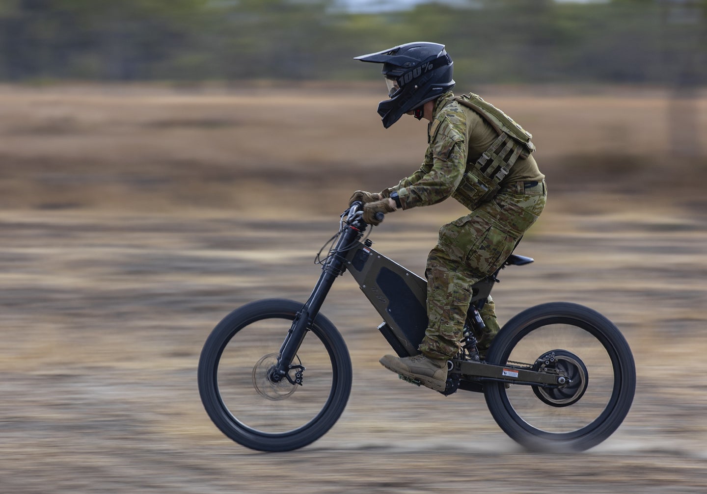 A Trooper from the 2nd/14th Light Horse Regiment training on an Australian Army Stealth Reconnaissance E-Bike in Queensland.