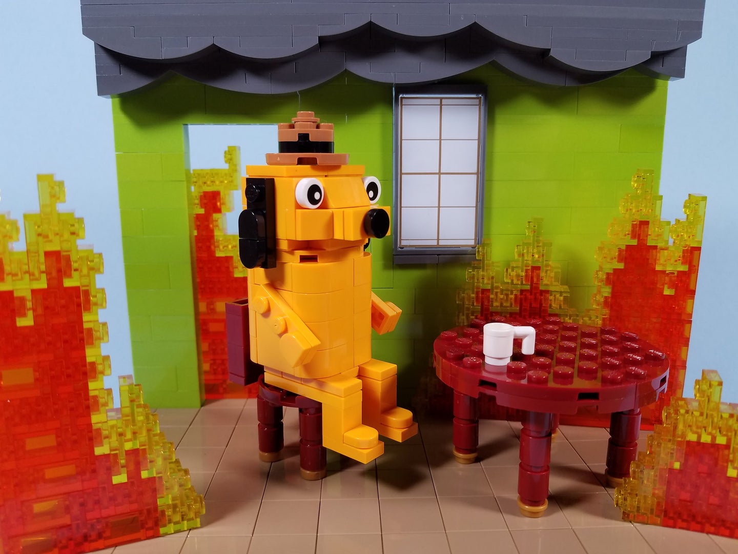 Lego construction of house on fire meme