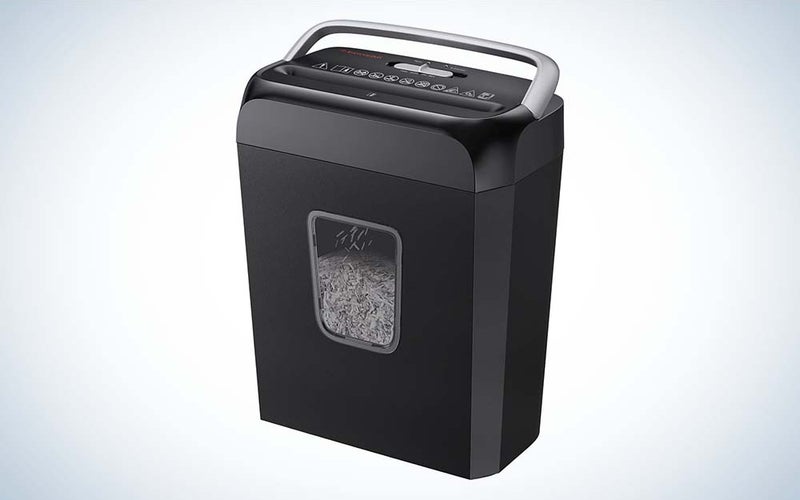 A square black papper shredder made by Bonsaii with a gray handle and small window in front showing shredded paper.