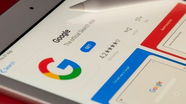 The Google app on a tablet with a stylus on the screen.