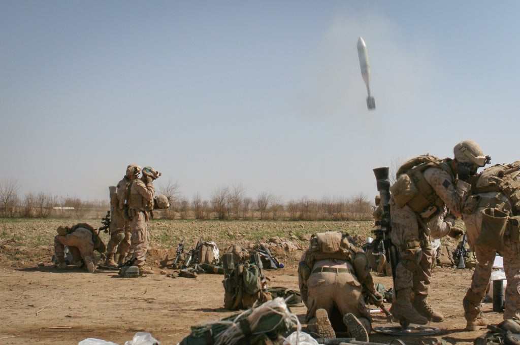 U.S. Marines shooting off a mortar in Afghanistan
