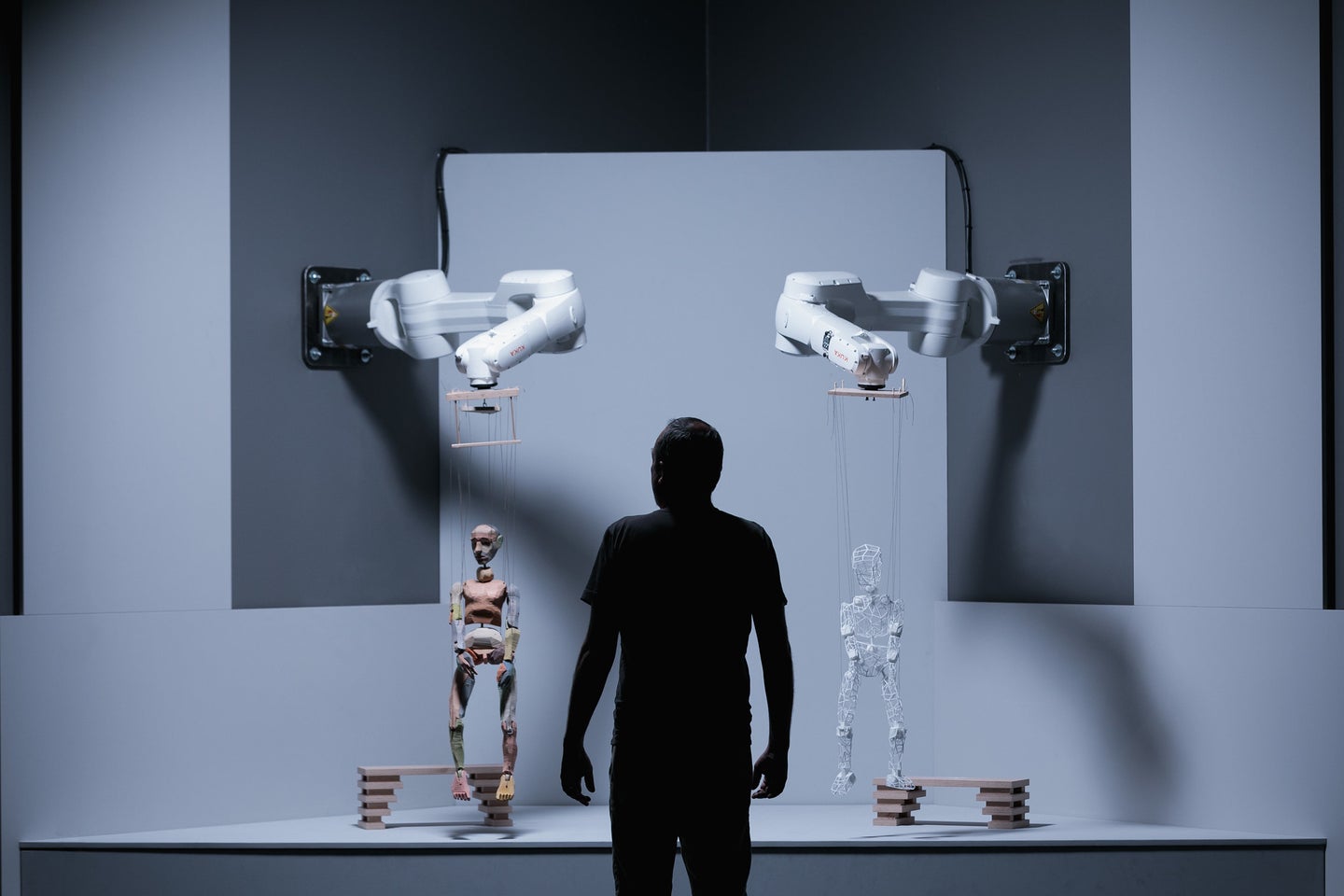 robot arms with marionettes