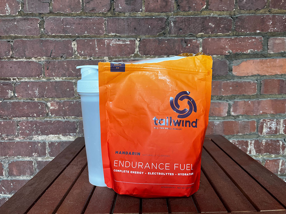 A bag of Tailwind Nutrition electrolyte mix on a wooden table