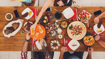 Thanksgiving dinner party with smartphones on the table