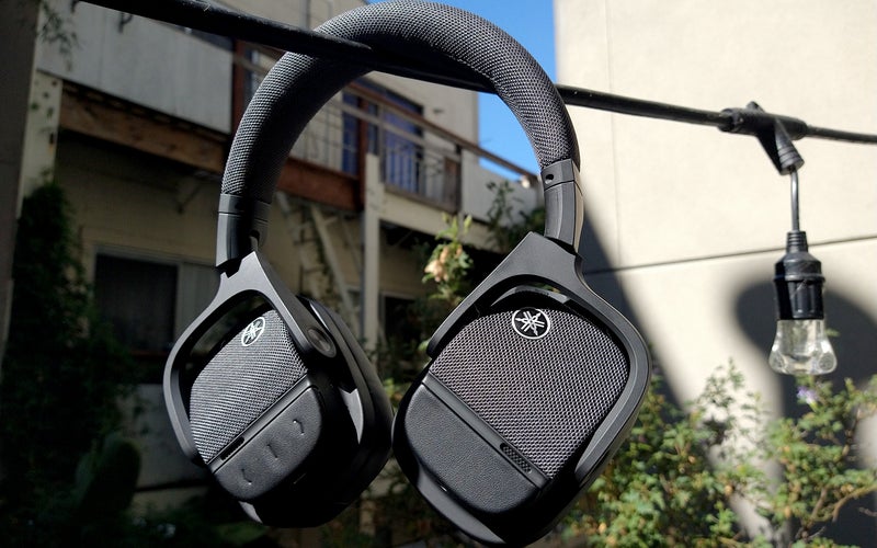 Yamaha YH-L700A headphones hanging in the sun outside