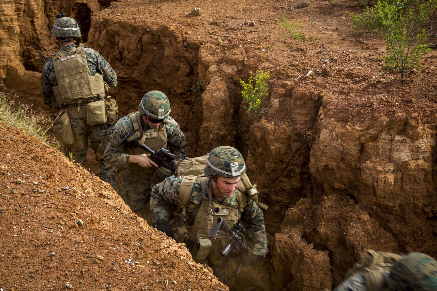 U.S. Marines and Sailors in a trench at Plum Barracks Training Area, New Caledonia, in 2017. One possible use for a gadget like Russia's "Spy Stone" is in trench or urban warfare.