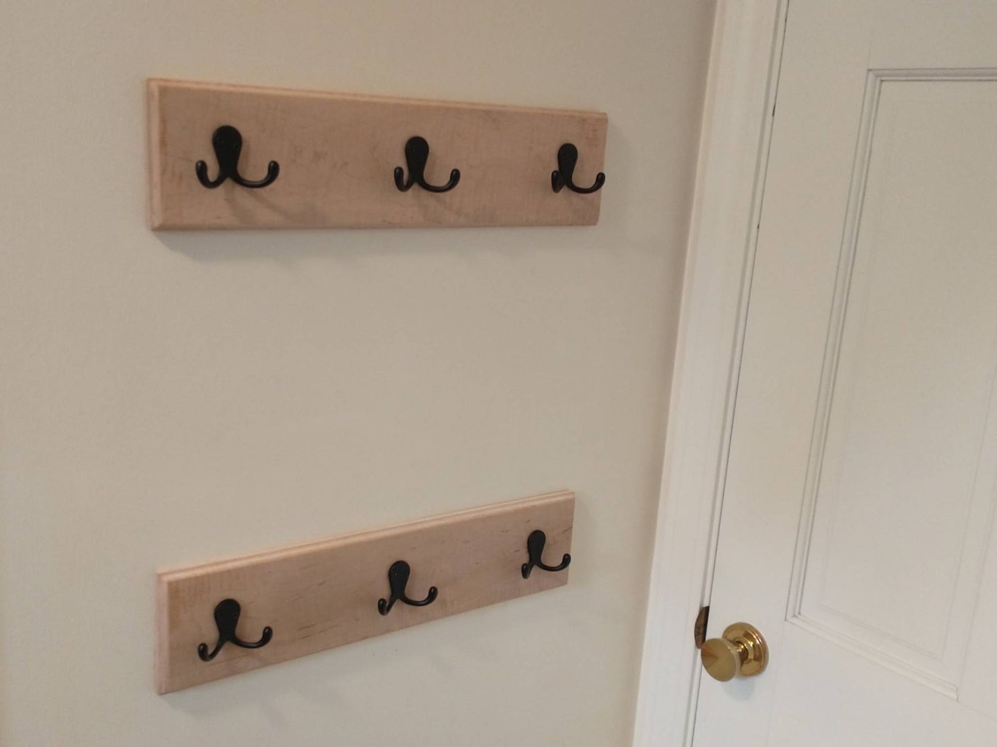 DIY wooden coat hooks by the door