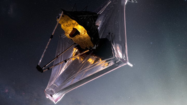 James Webb Space Telescope in flight with mirrors and sunshield unfurled in an artist's rendering