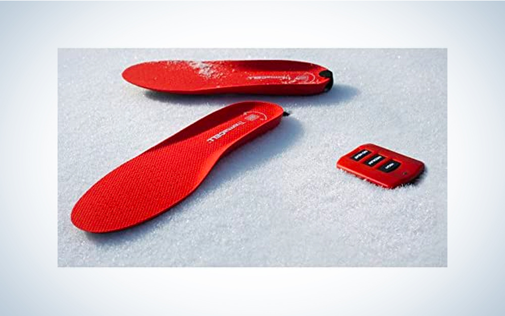 A pair of red Thermacell Original Heated Insoles on a blue and white background