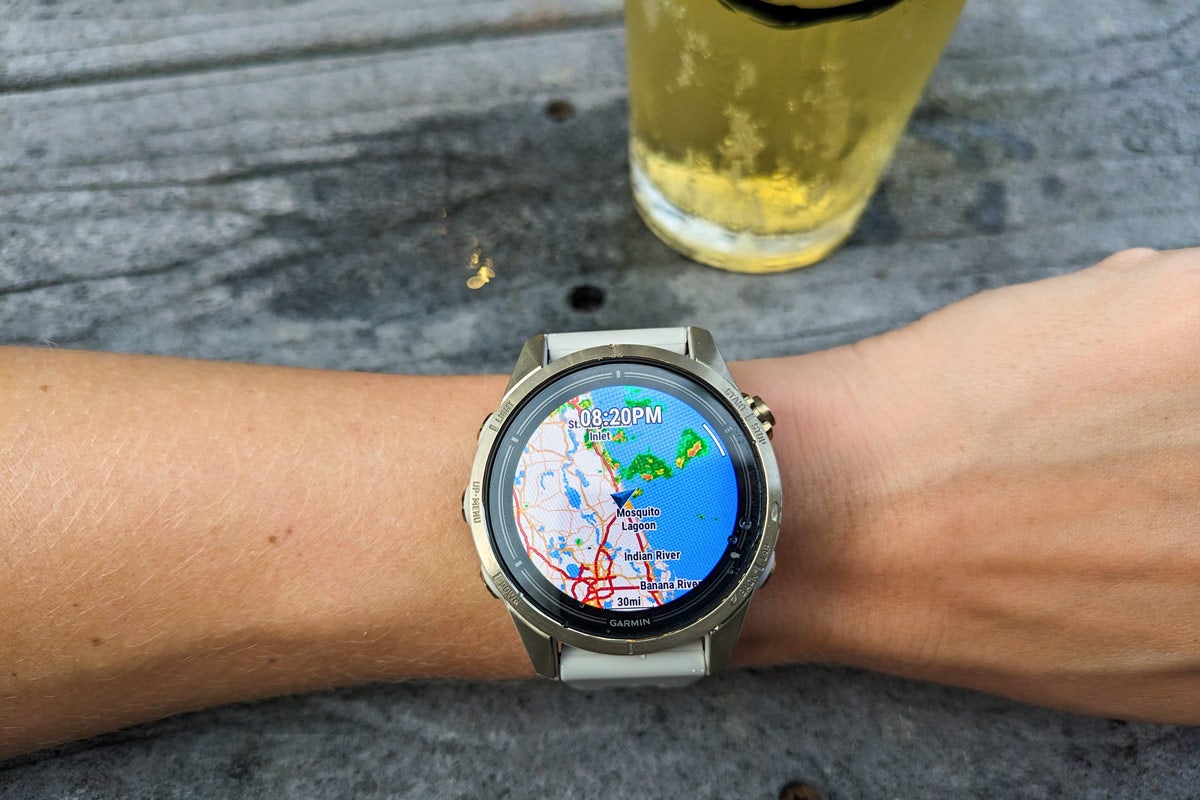 The weather map overlay displayed on the Garmin epix Pro on a wrist resting on a table