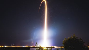a rocket launching at night
