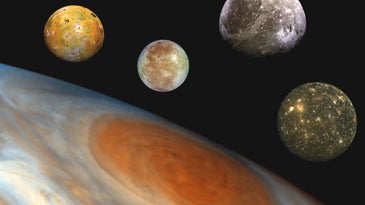 Jupiter's surface and red spot with moons in the background. the four moons in the background are yellow, pink and white, gray, and mottled yellow