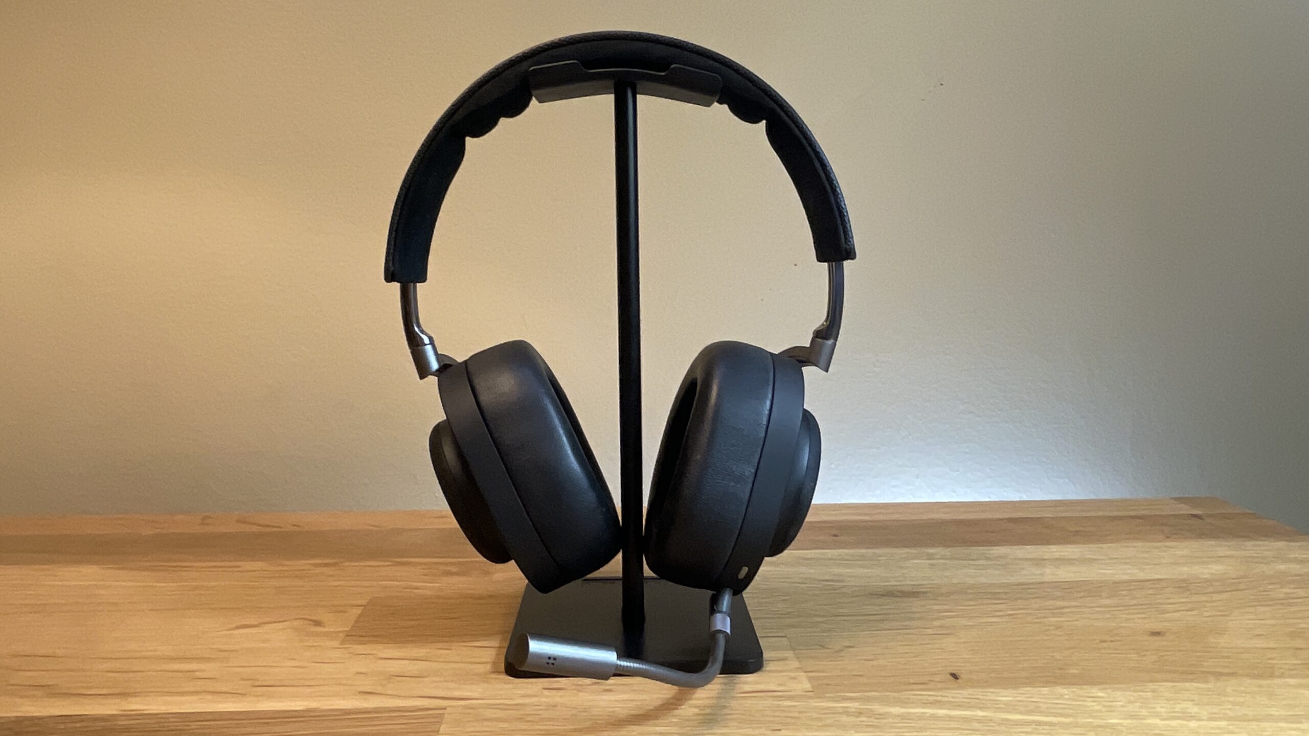 Master & Dynamic MG20 headphones on a stand