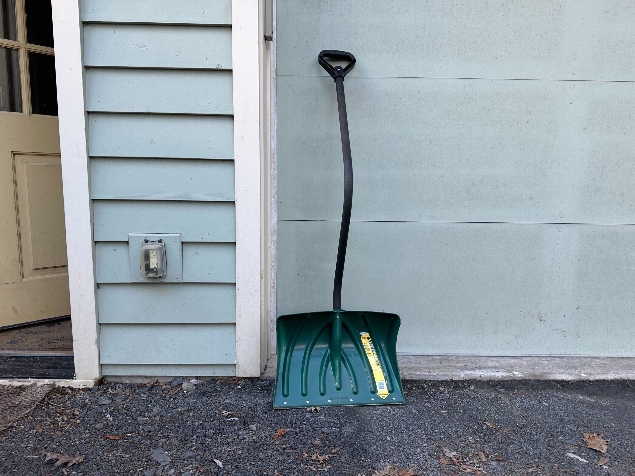 This green Suncast snow shovel is the best ergonomic snow shovel