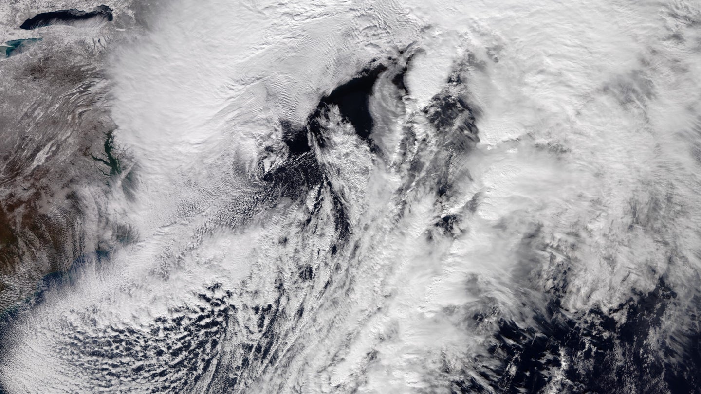 a large cloud system snowstorm swirls above the north east United States, taken from a satellite