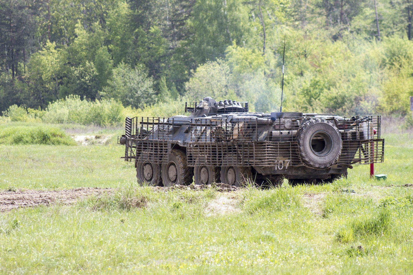 an armored personnel carrier in a field