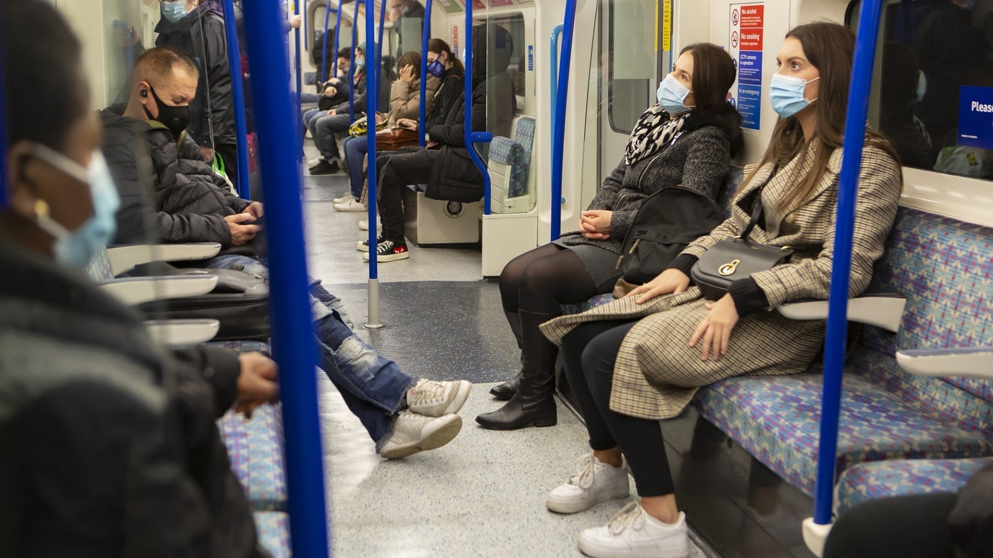 People wear COVID masks in on public transportation