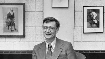 E.O. Wilson in his Harvard evolutionary biology office in a black and white photo