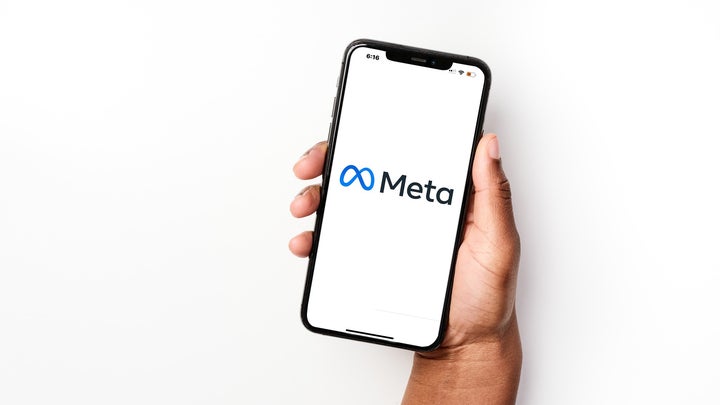 meta logo on iphone screen