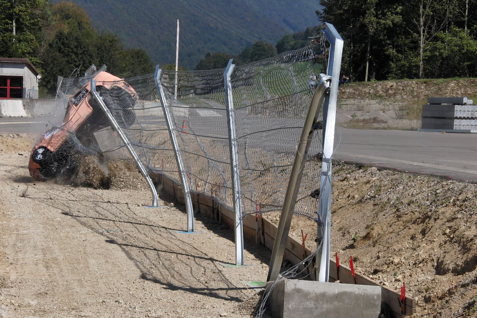 Watch this race track fence undergo a Formula One crash test