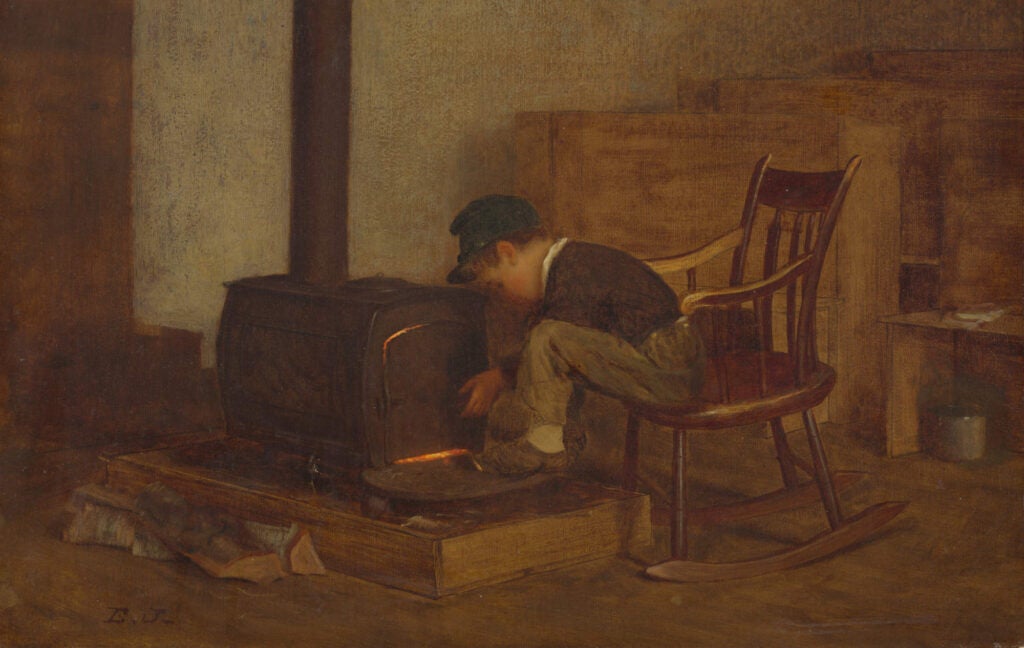 Young boy in a blue cap sitting in a rocking chair and refueling a wood stove in a 19th-century oil painting by Eastman Johnson