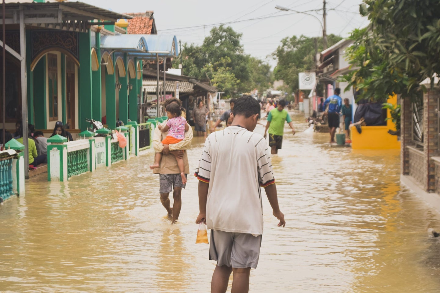 Flooded neighborhood in Bangladesh due to climate change and maladaptation