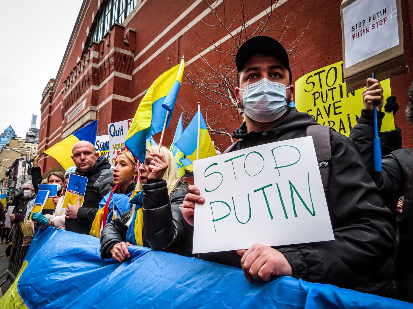 Protesters oppose Russia's attack on Ukraine, which is causing a health care crisis.