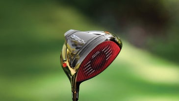 TaylorMade Stealth driver in front of grass