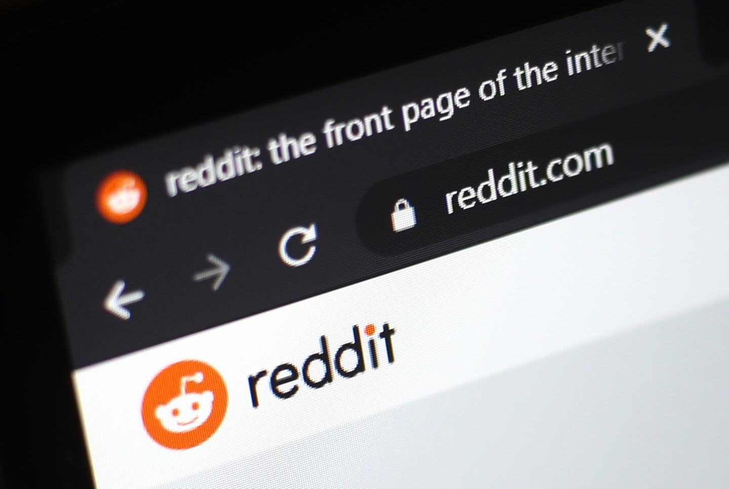 A close-up of Reddit in the Google Chrome browser on a laptop.