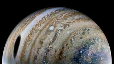 Jupiter’s largest moon wrestles for attention with its Big Red Spot