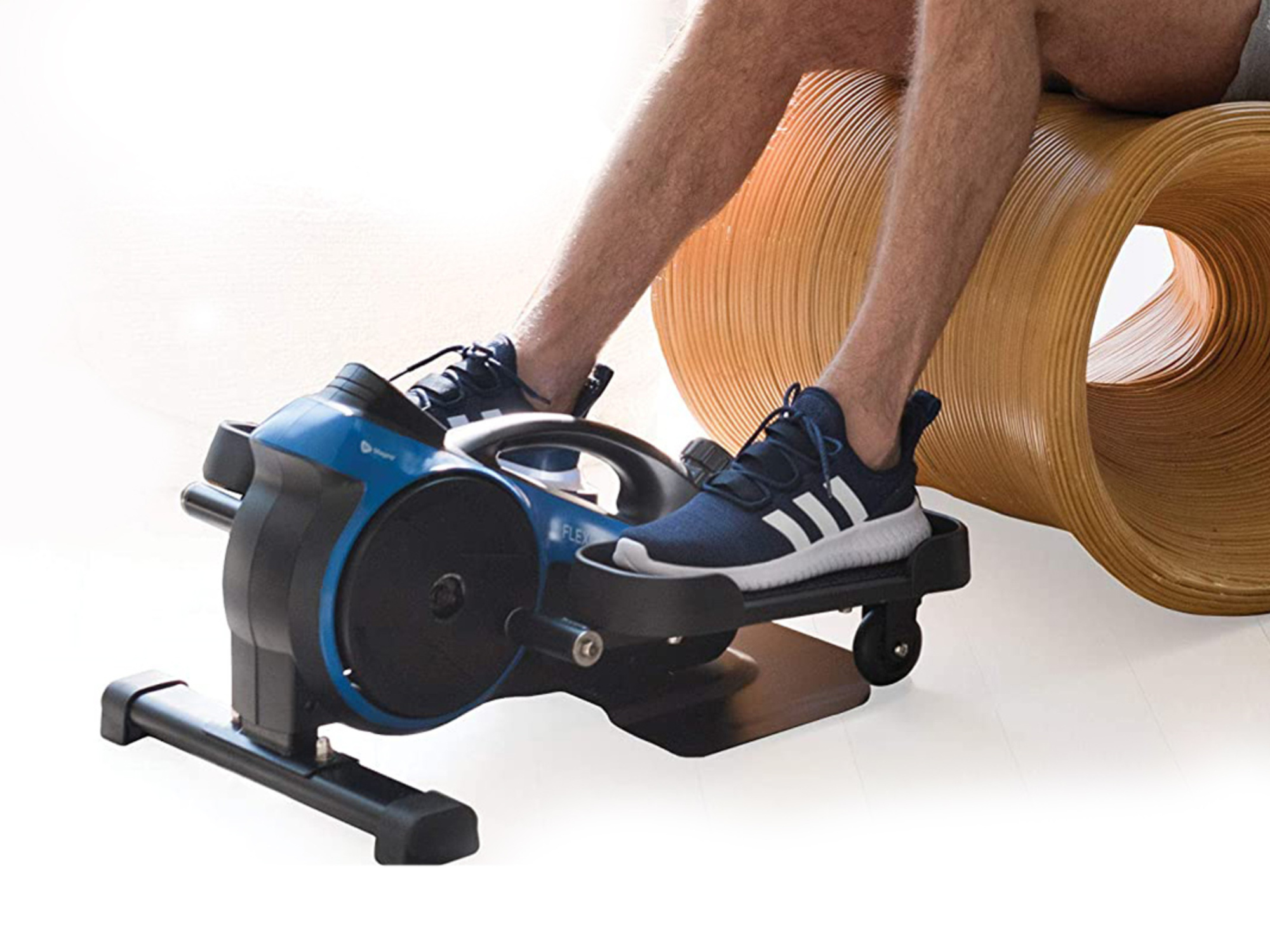 Squeeze in a workout every day with this under-desk mini elliptical