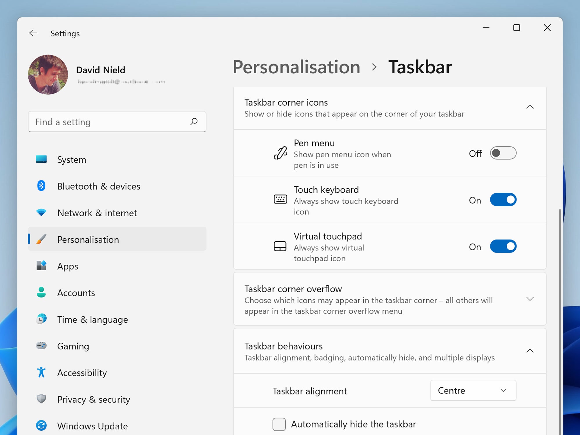 The Windows 11 taskbar customization and personalization settings on a tablet.