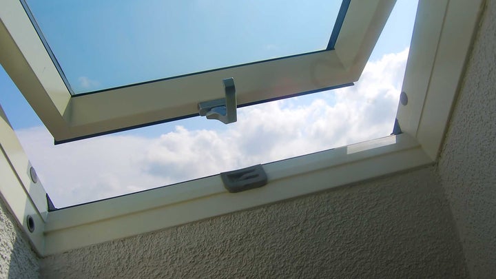 A photo of an open window, skylight.