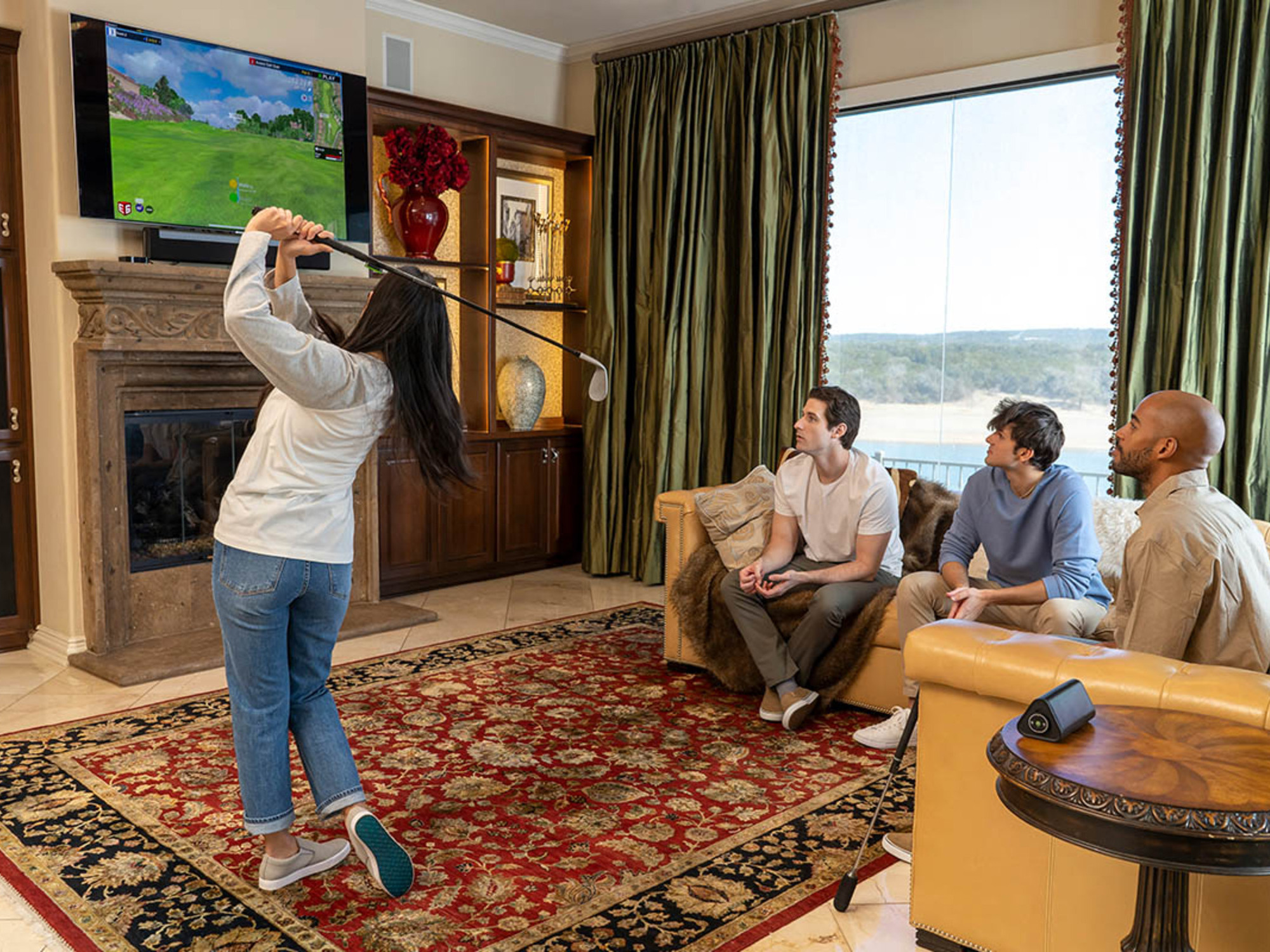Family playing digital golf in their living room