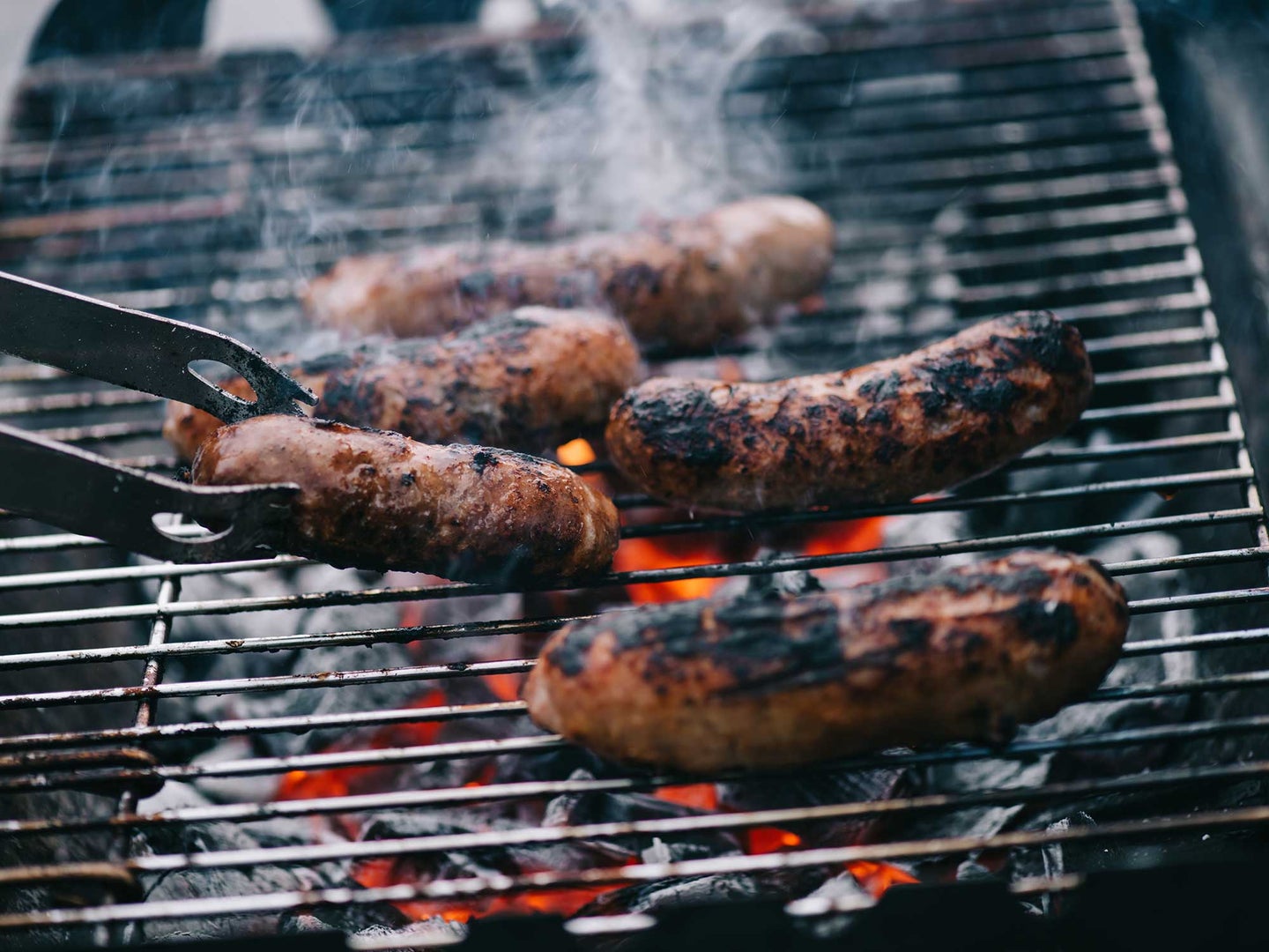Photo of sausages on the grill.