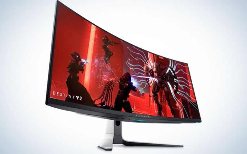 An Alienware curved gaming monitor with a red screen at an angle