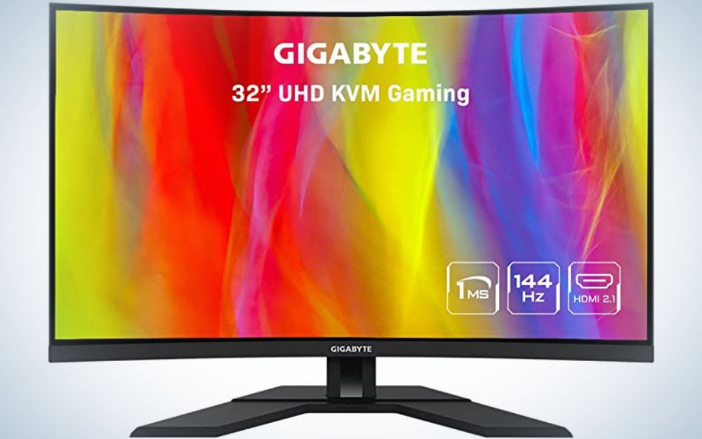 A Gigabyte curved monitor with a rainbow background