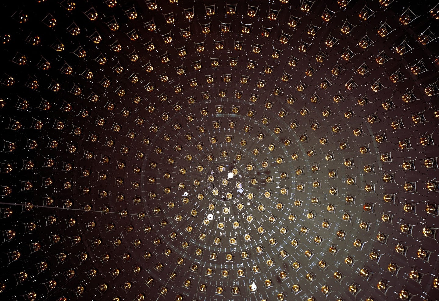 Photodetectors in a circular array in a large neutrino detector experiment at Fermilab