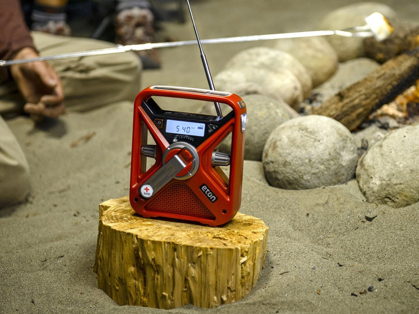 An all-weather radio on a log