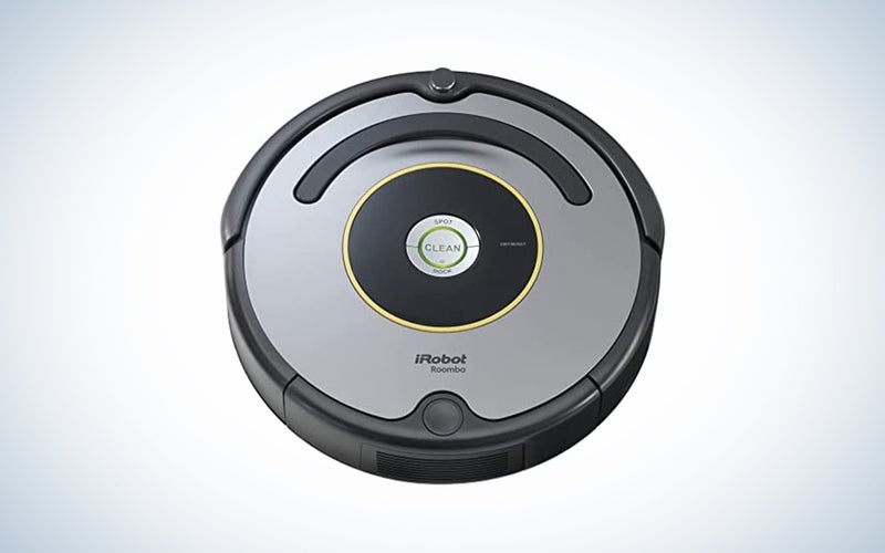 A refurbished Roomba 630 against a blue and white gradient background