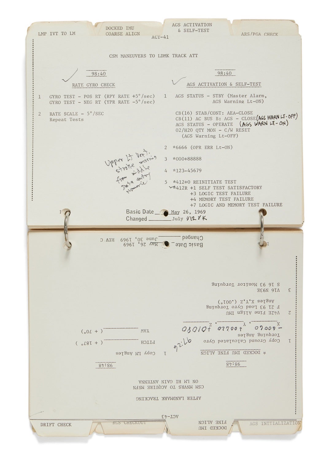Notebook with lunar flight tasks in black ink