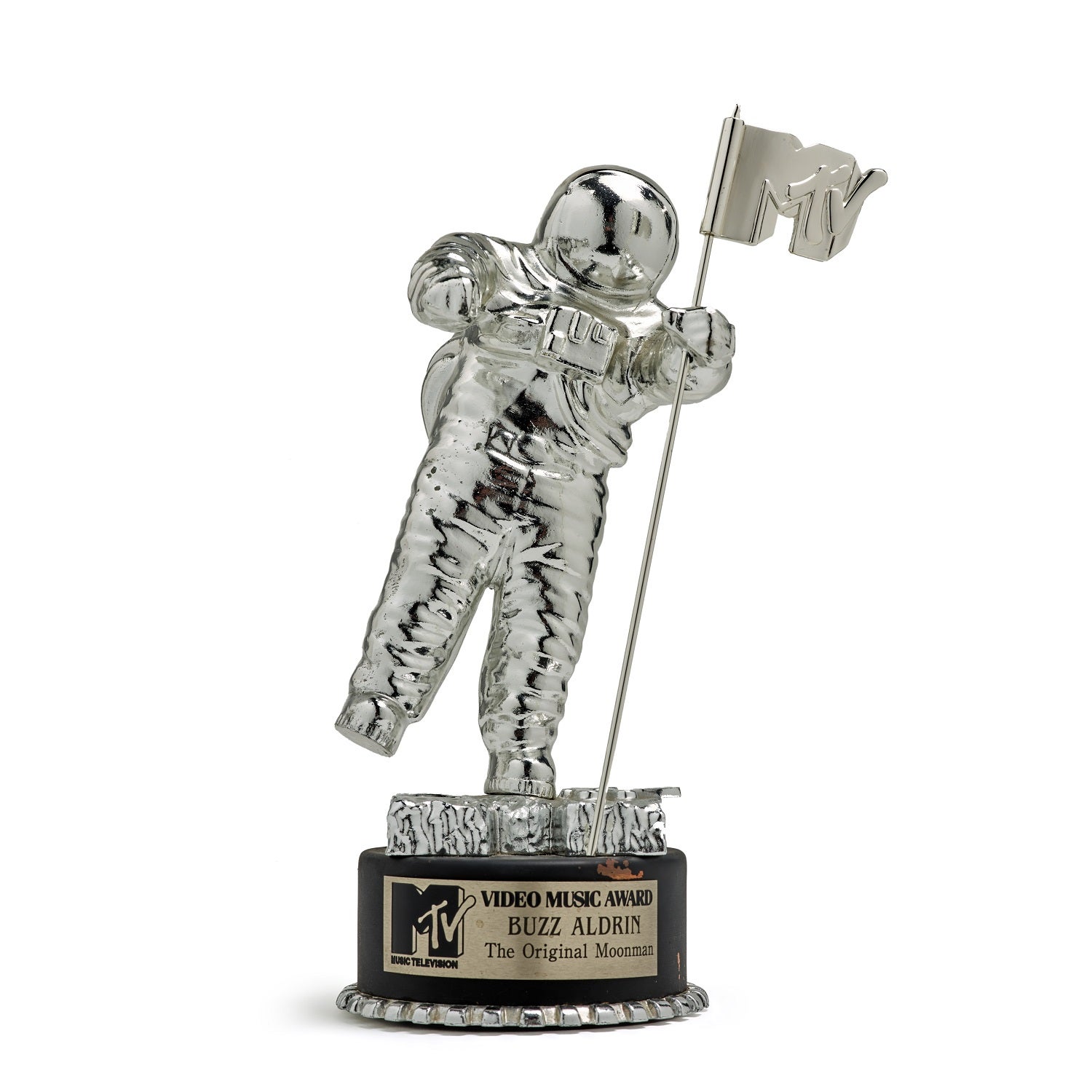 Silver astronaut trophy with "original moonman" plaque including MTV logo