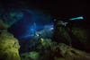 Divers swim into Vintany cave