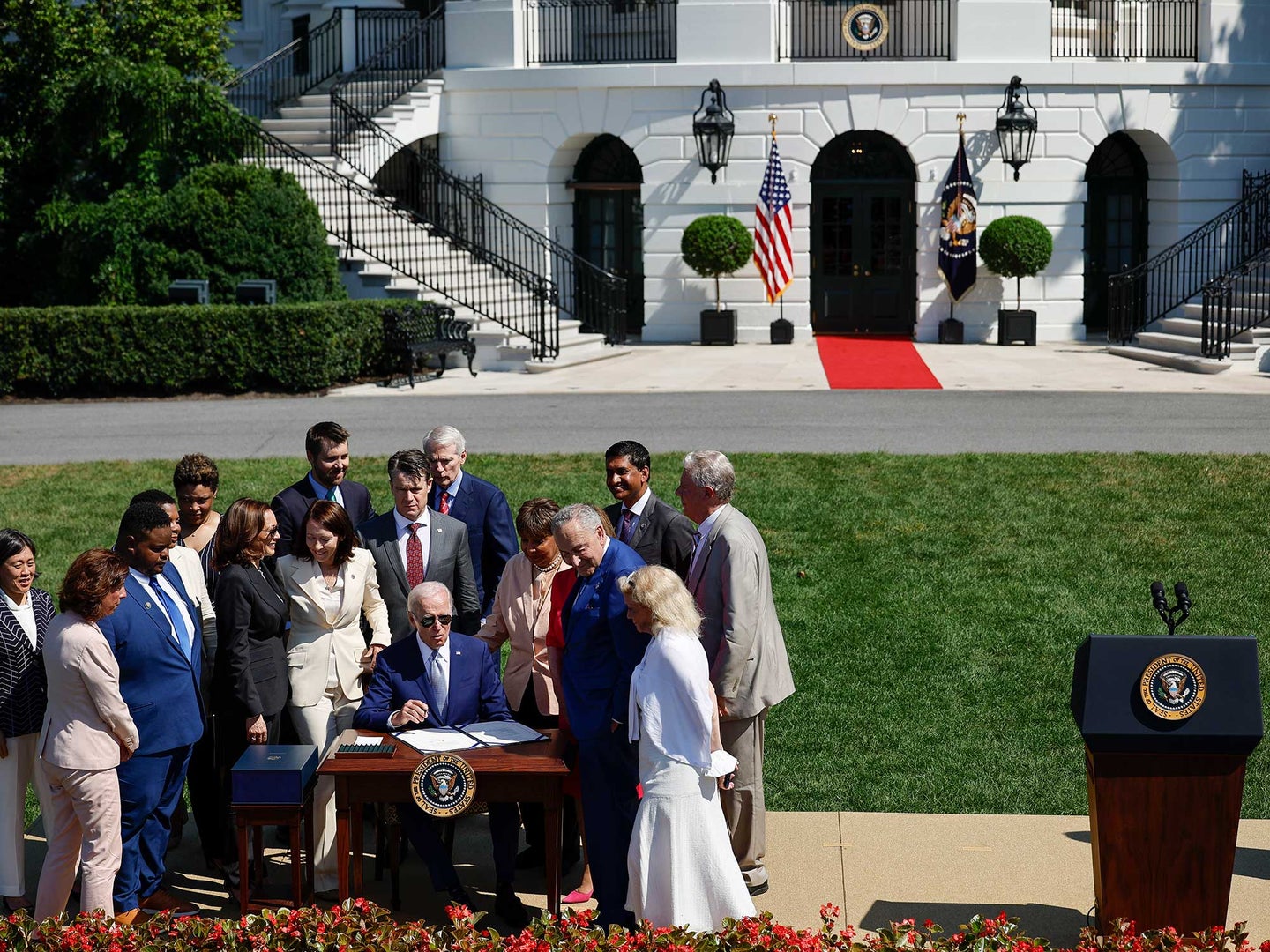 U.S. President Joe Biden signs the CHIPS and Science Act of 2022 during a ceremony on the South Lawn of the White House on August 9, 2022 in Washington, DC.