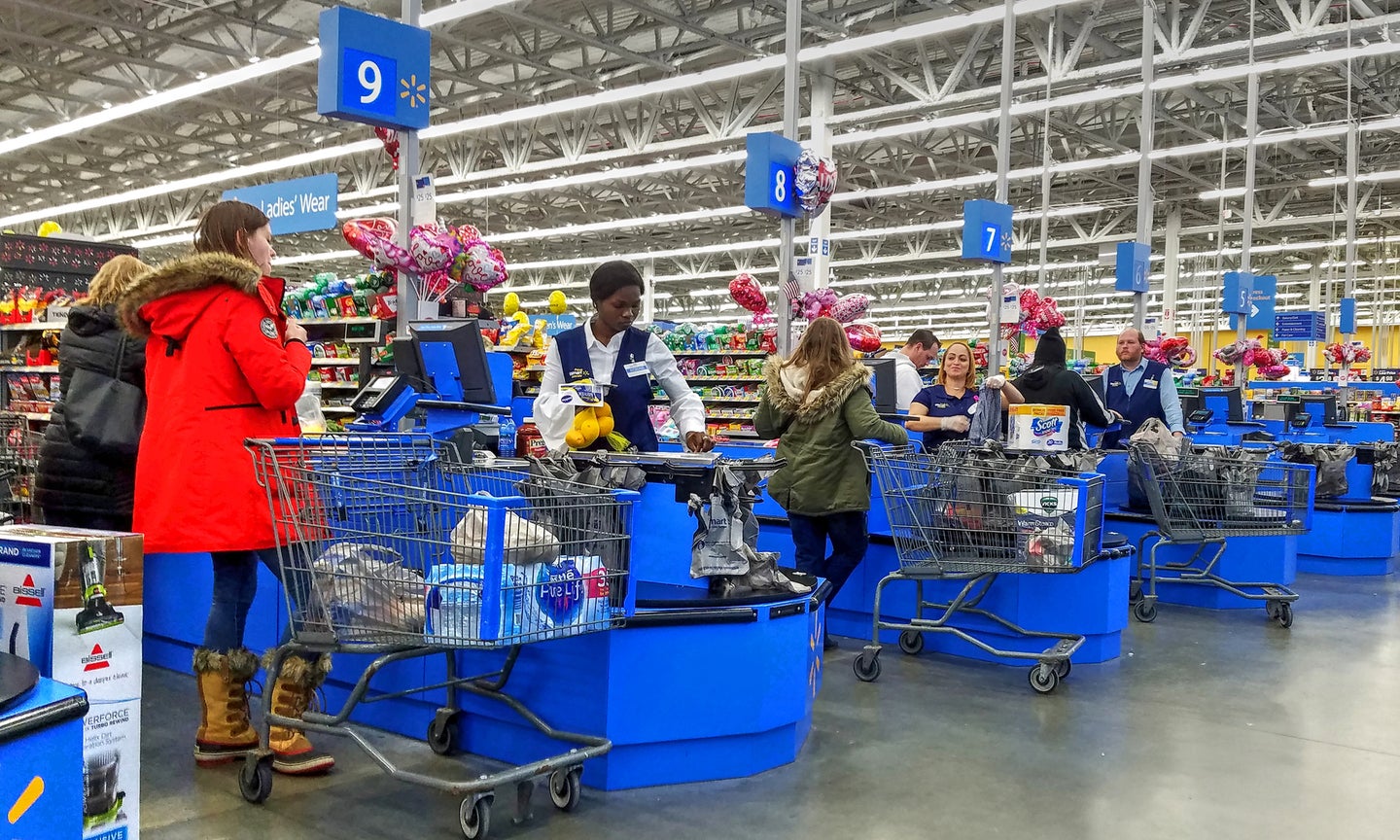 Photo of customers in line to checkout at a Walmart