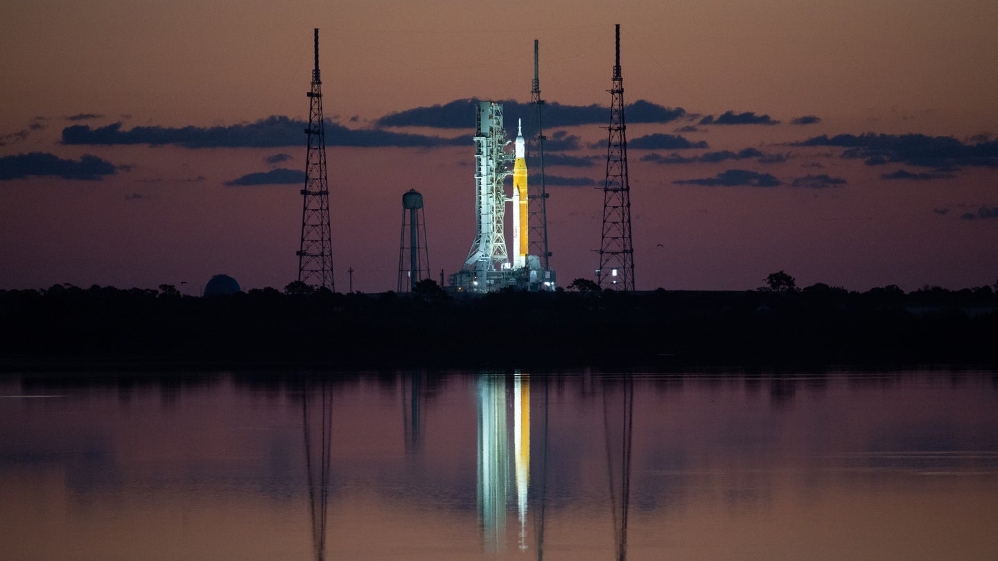 NASA’s Space Launch System (SLS) rocket with the Orion spacecraft aboard is seen at sunrise atop a mobile launcher at Launch Complex 39B, Monday, April 4, 2022.