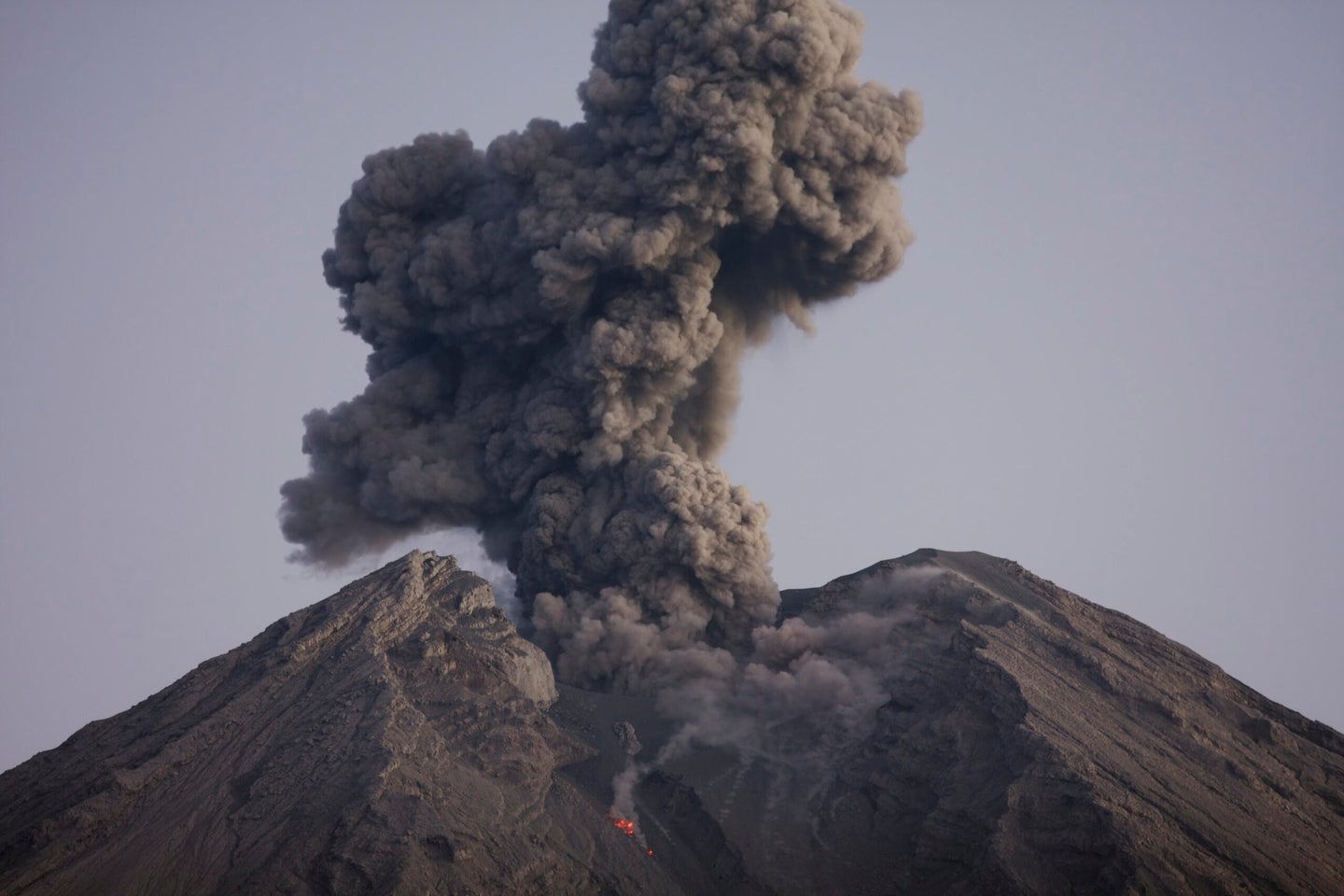 A cloud of deadly volcanic ash spews from a volcano.