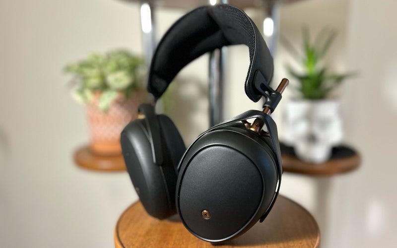 Meze Audio closed-back planar-magnetic headphones on a plant stand